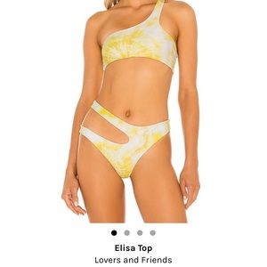 Super cute lovers and friends bikini set!! Brand new with tags!!